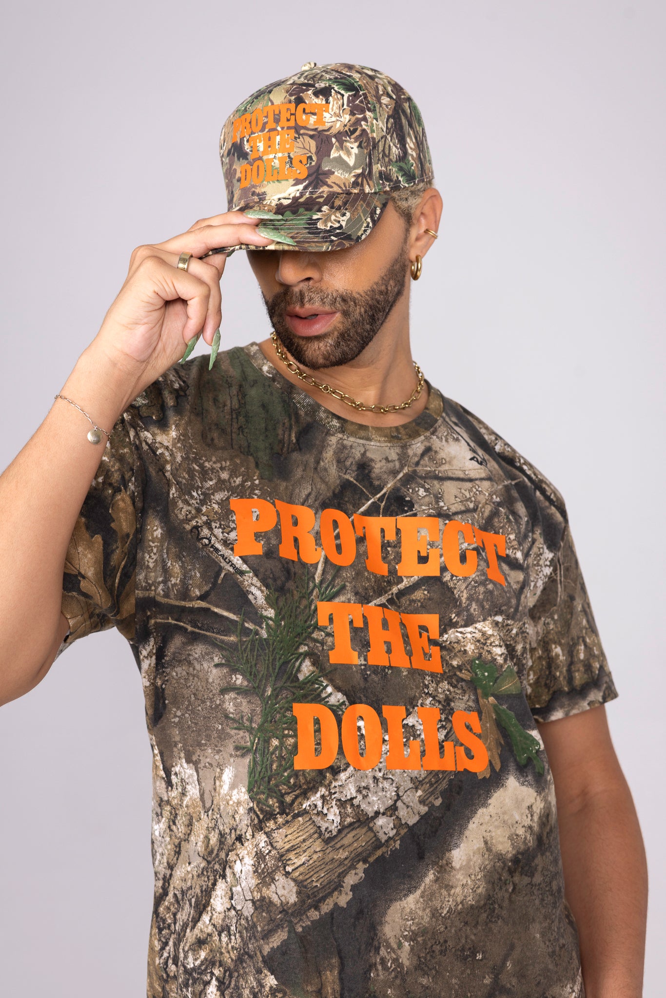 Camo- Protect The Dolls Trucker Hat- Pride 25